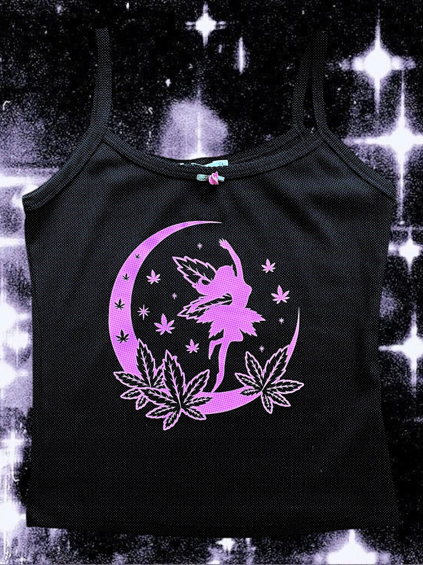 A black tank top with a graphic design featuring a fairy-like figure on a crescent moon, surrounded by leaves and stars.