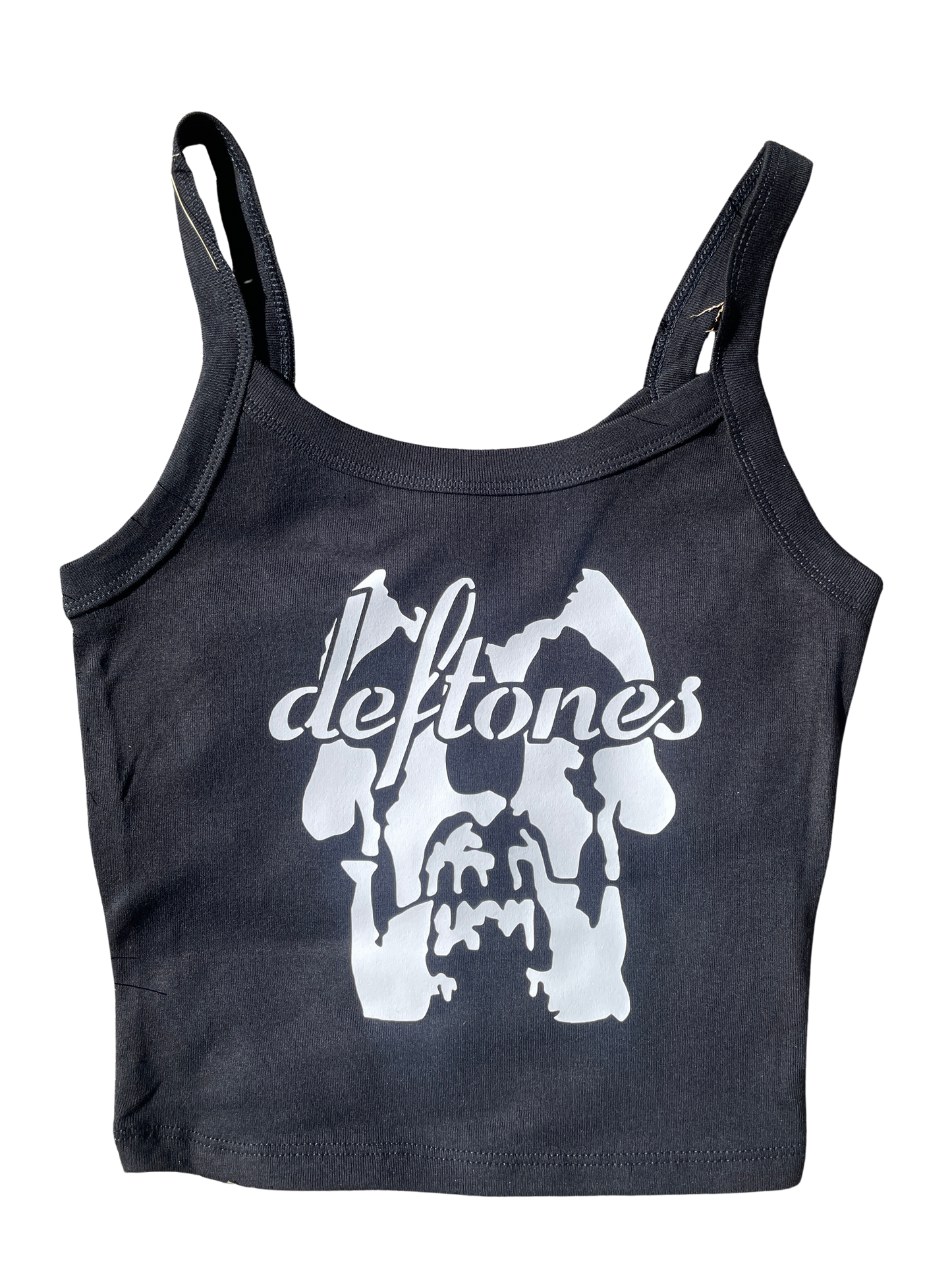 A black tank top with a white graphic design featuring the text "deftones" and a stylized image of a skull or skull-like shape.