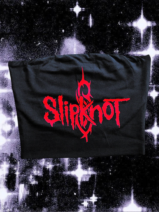 Black tube top featuring a bright red Slipknot logo with the band’s signature tribal “S” symbol in the background. The top is laid flat on a sparkly black-and-white star field backdrop.