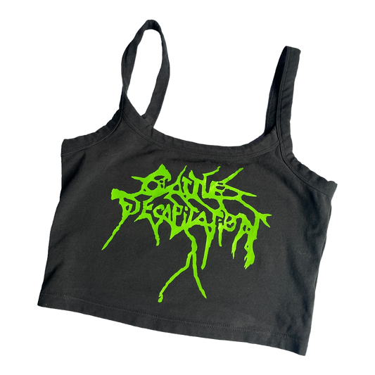 a black crop top with green graffiti on it