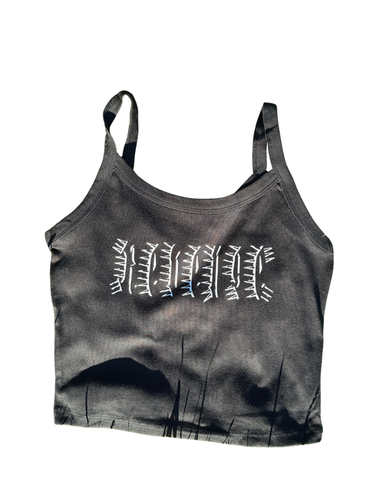 a gray tank top with white text printed on it.