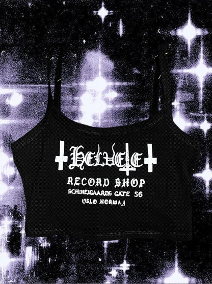 Black cropped spaghetti strap cami with “Helvete Record Shop” printed in white glitter vinyl. The design includes gothic text, upside-down crosses, and the address "Schweigaards Gate 56, Oslo Norway." Shirt is laid flat on a cosmic black-and-white starry background.
