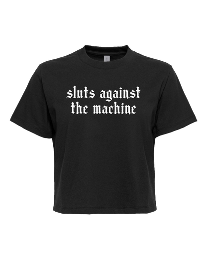 A black t-shirt with white text that reads "sluts against the machine".